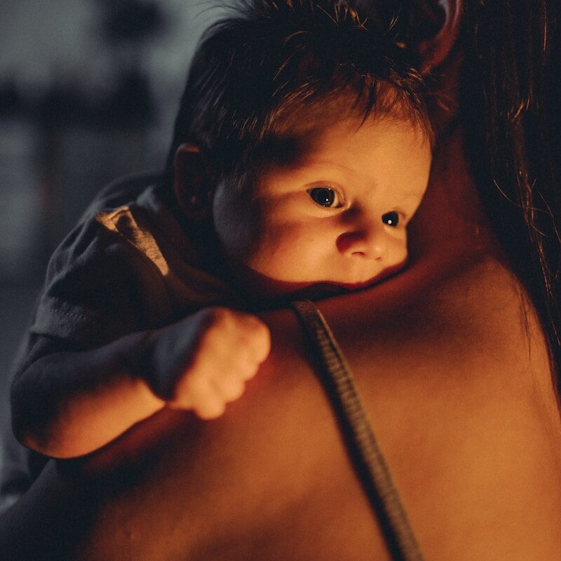 a baby with a person's head